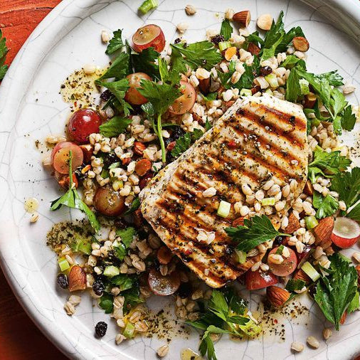 Chargrilled swordfish with grape, almond & barley salad
