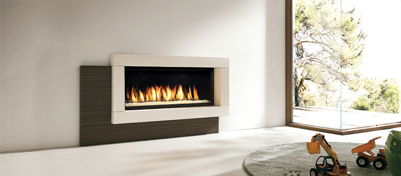 Linear Gas Fireplace by Marquis with 4 sided trim